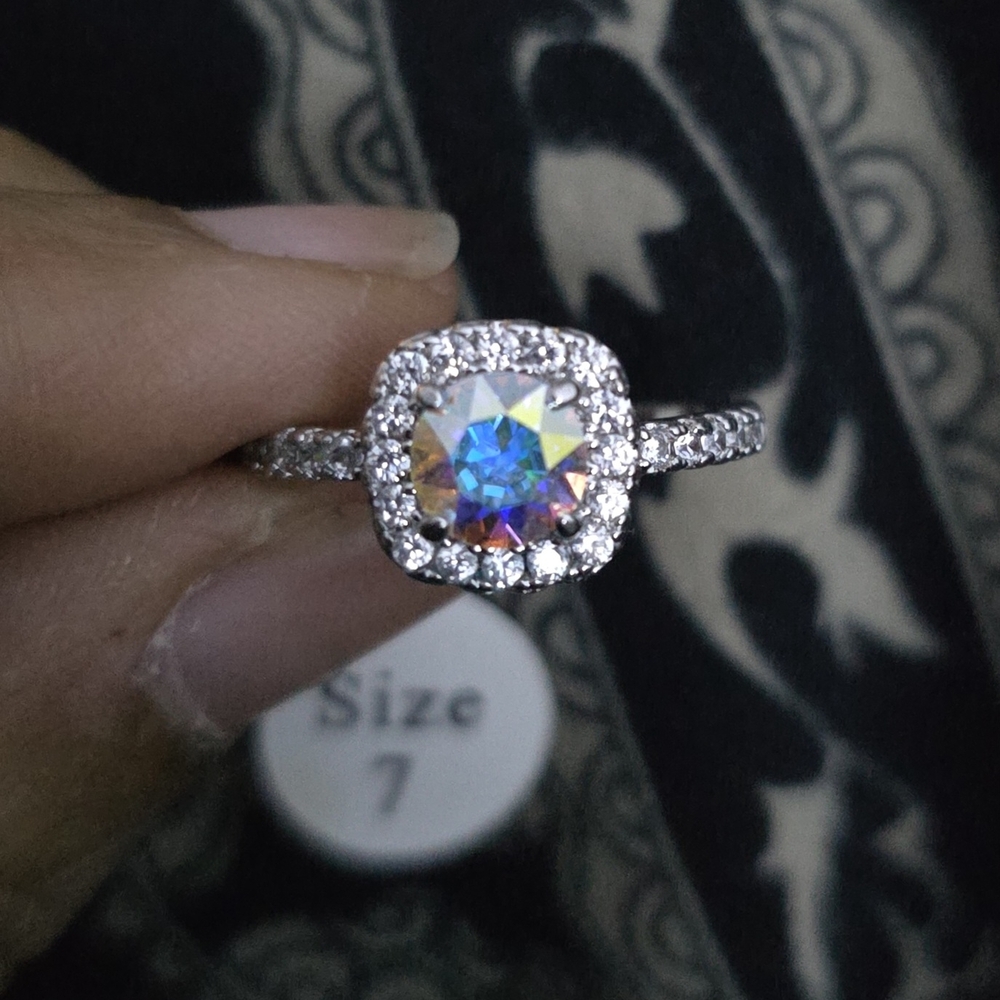 Fragrant Jewels Silver and Blue Ring with Intricate Metalwork